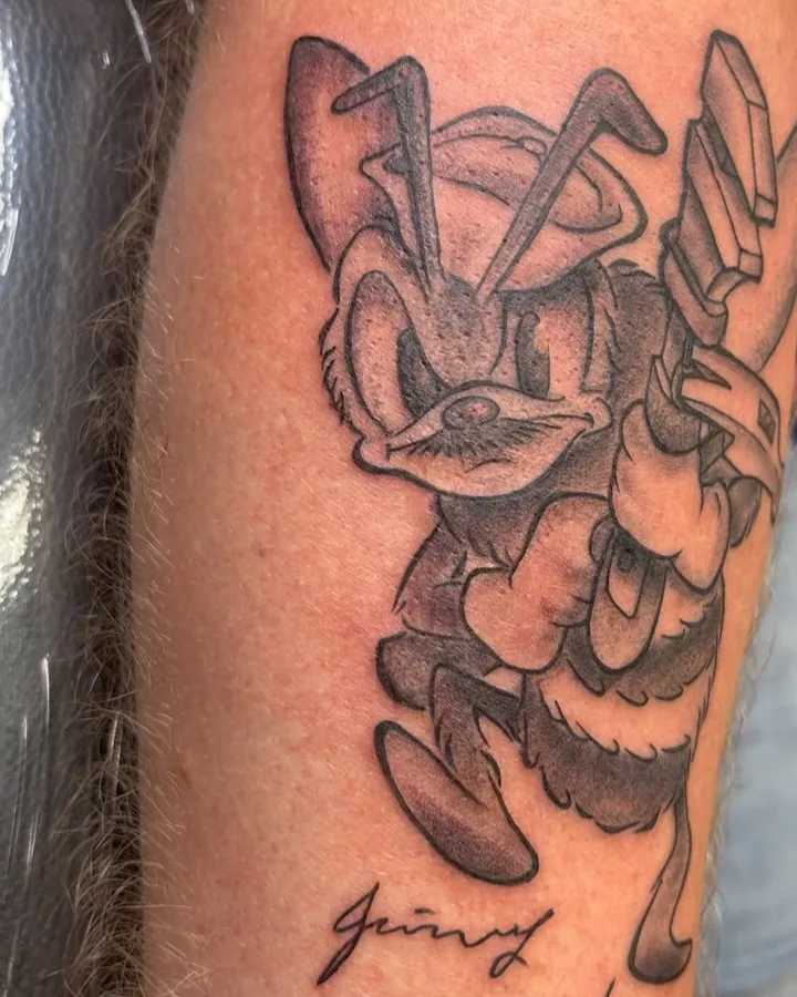 Cartoon duck tattoo by Lil Angel