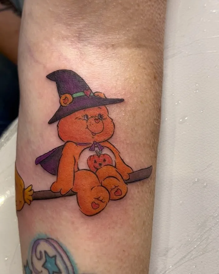 Colour witch bear on a broomstick, by Lil Angel